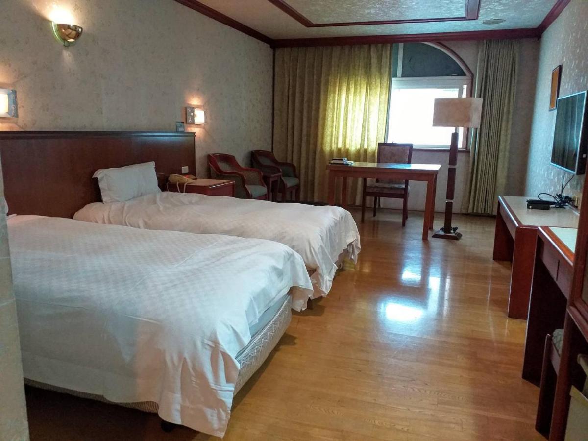 Nikaido Business Hotel Minxiong Экстерьер фото